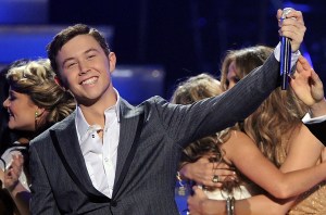 Scotty McCreery is announced the American Idol for 2011 onstage performs onstage during Fox's 