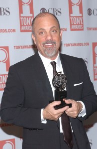 Billy Joel poses after winning win Best Orchestration for 