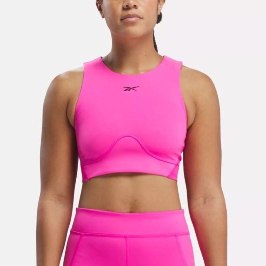 model wearing hot pink crop top