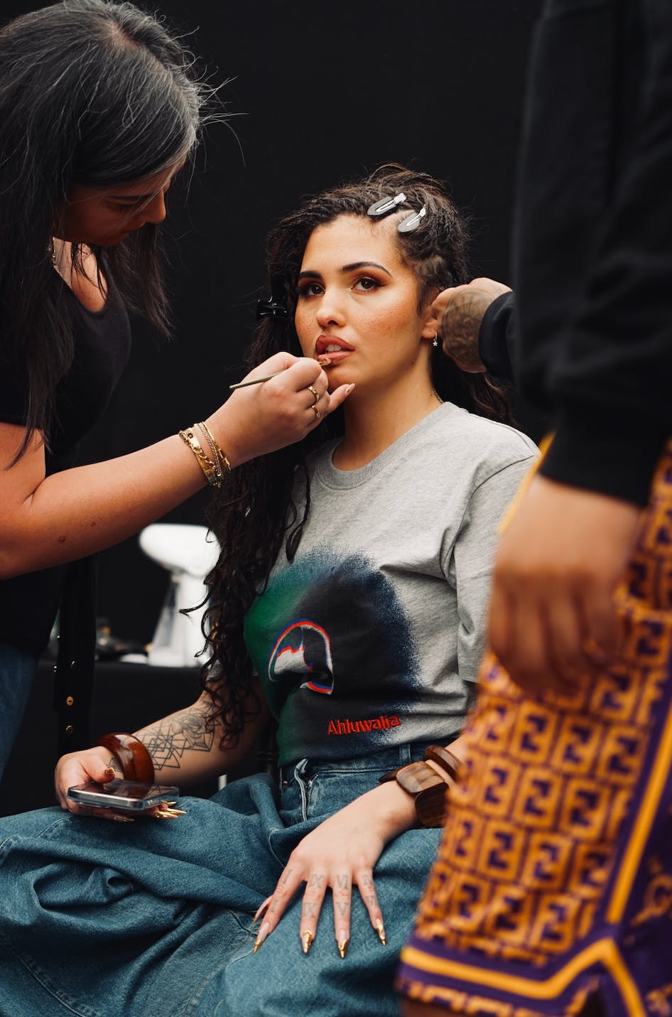 Woman getting her makeup done