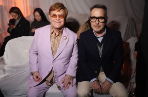 Elton John and David Furnish attend Valentino Pavillon des Folies Show as part of the Paris Fashion Week on Sept. 29, 2024 in Paris, France.